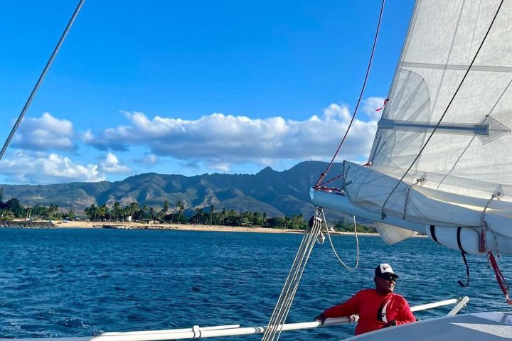 a group of people on a boat in a body of water